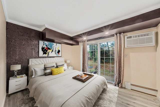 bedroom with light hardwood / wood-style floors, an AC wall unit, baseboard heating, and ornamental molding