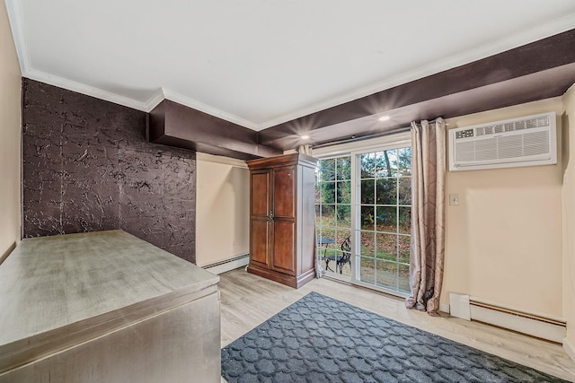 interior space featuring a wall unit AC, wood-type flooring, a baseboard radiator, and ornamental molding