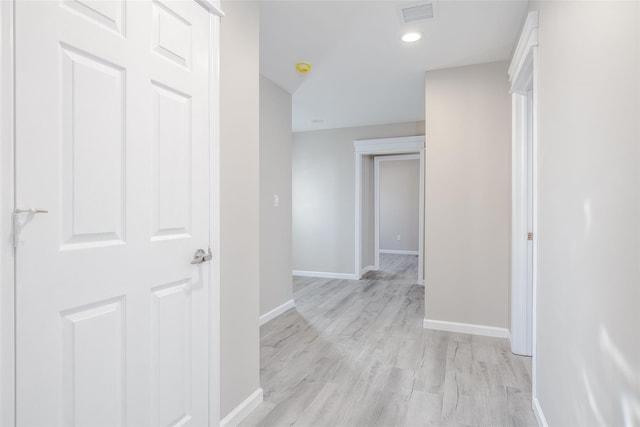 corridor featuring light wood-type flooring