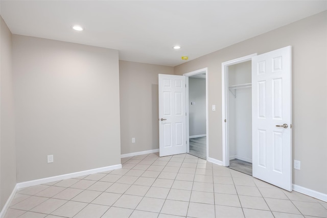 unfurnished bedroom with a closet