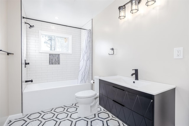 full bathroom featuring tile patterned floors, vanity, toilet, and shower / bath combo