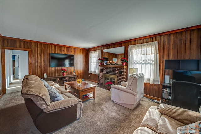 carpeted living room with wood walls and a brick fireplace