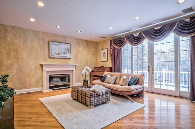 living room with light hardwood / wood-style floors