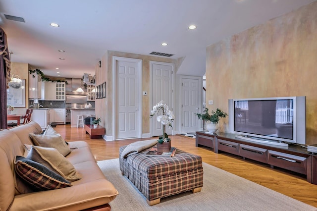 living room featuring light hardwood / wood-style flooring