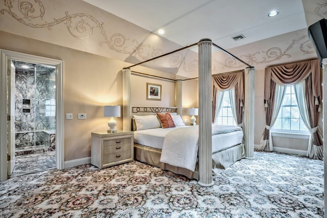 carpeted bedroom featuring vaulted ceiling