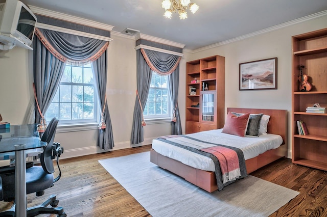 bedroom featuring wood-type flooring, crown molding, and a chandelier