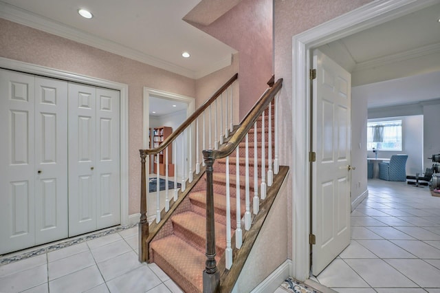 stairway featuring tile patterned flooring and crown molding