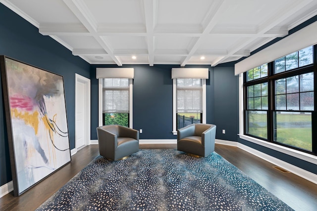 sitting room featuring beamed ceiling, coffered ceiling, and dark wood-type flooring