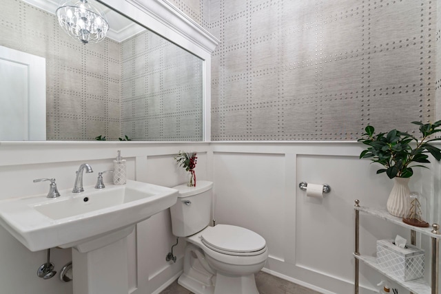 bathroom with toilet and sink