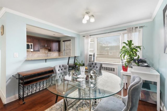 2 Soundview Ave Unit 2D, White Plains, NY 10606 - dining space featuring wood finished floors and ornamental molding