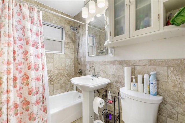 2 Soundview Ave Unit 2D, White Plains, NY 10606 - bathroom with shower / tub combo with curtain and tile walls
