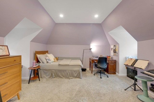 carpeted bedroom with vaulted ceiling