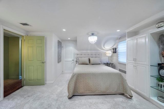 carpeted bedroom featuring radiator heating unit