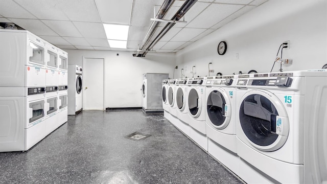 clothes washing area with washer and dryer and stacked washer and dryer