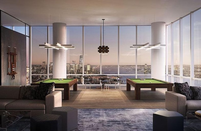 game room with expansive windows and pool table