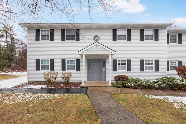 view of front of house with a front lawn