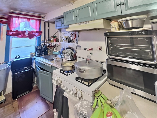 kitchen with range and sink