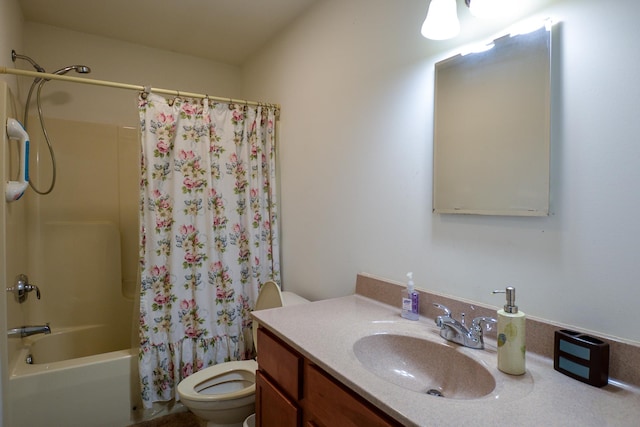 full bathroom featuring shower / bath combination with curtain, toilet, and vanity