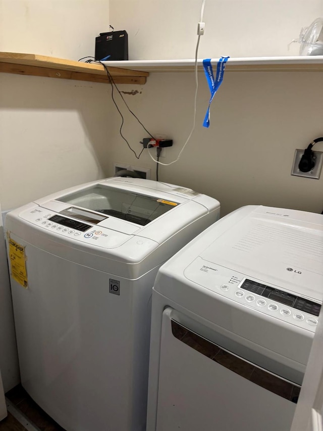 laundry area with washer and dryer