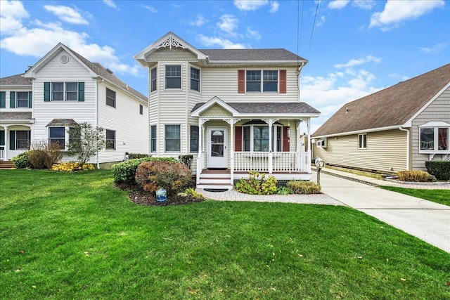 view of front of home featuring a porch and a front lawn