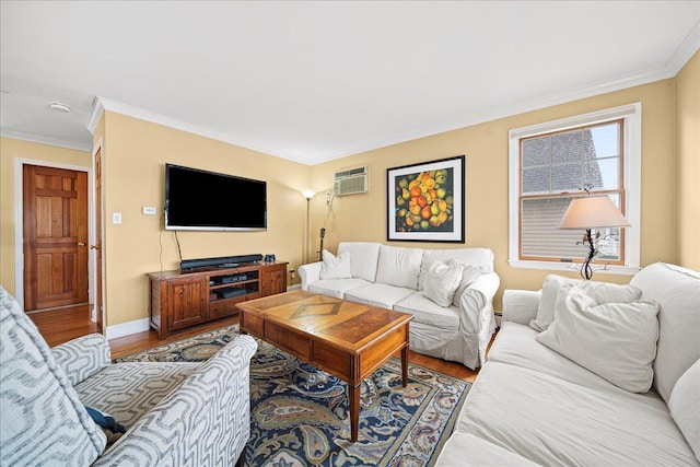 living room featuring hardwood / wood-style floors, a wall mounted AC, and crown molding