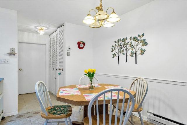 423 Woodbridge Unit D, Ridge, NY 11961 - dining space featuring baseboard heating, a chandelier, and light tile patterned flooring