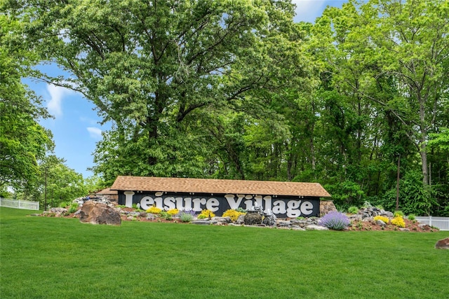 423 Woodbridge Unit D, Ridge, NY 11961 - community / neighborhood sign featuring a yard