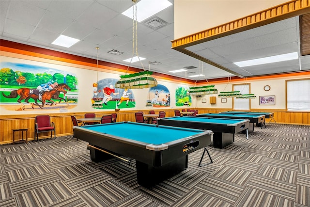 423 Woodbridge Unit D, Ridge, NY 11961 - recreation room with a paneled ceiling, pool table, carpet flooring, wainscoting, and wood walls