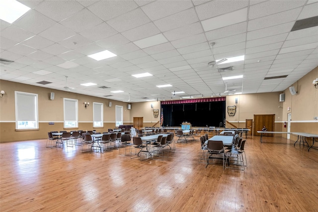 423 Woodbridge Unit D, Ridge, NY 11961 - miscellaneous room featuring wood finished floors and a drop ceiling