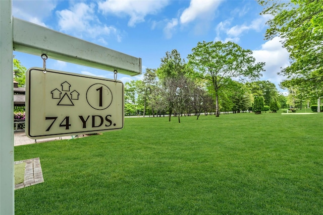 423 Woodbridge Unit D, Ridge, NY 11961 - community sign with a lawn