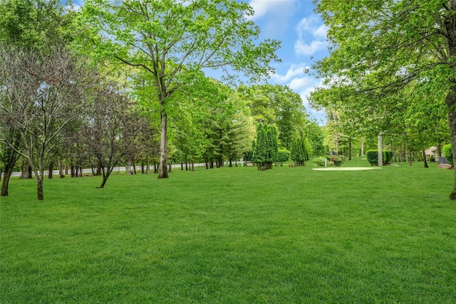 423 Woodbridge Unit D, Ridge, NY 11961 - view of home's community with a yard