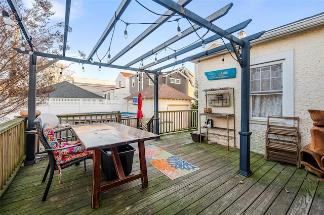 wooden deck featuring a pergola