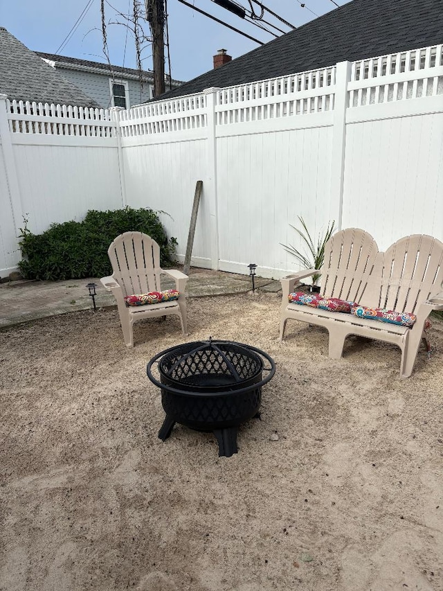 208 Franklin Blvd, Long Beach, NY 11561 - view of patio / terrace with an outdoor fire pit