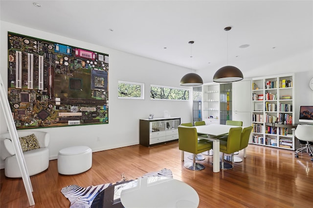 dining room with hardwood / wood-style floors