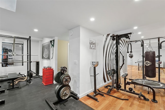 workout area featuring hardwood / wood-style flooring