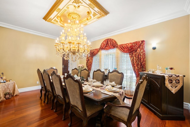 dining space with an inviting chandelier, dark wood-type flooring, and ornamental molding