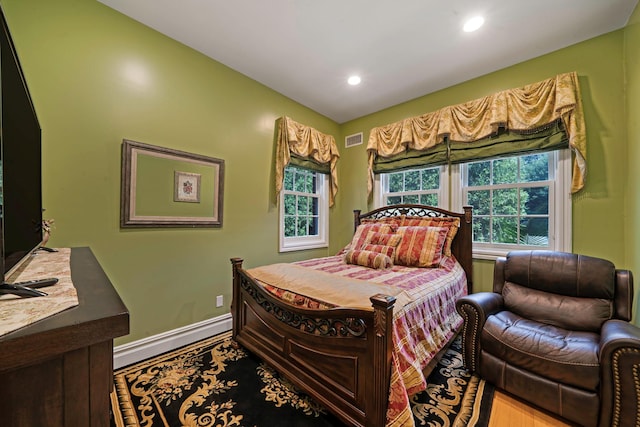 bedroom featuring hardwood / wood-style floors