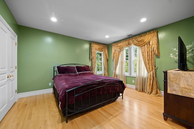 bedroom featuring light hardwood / wood-style floors