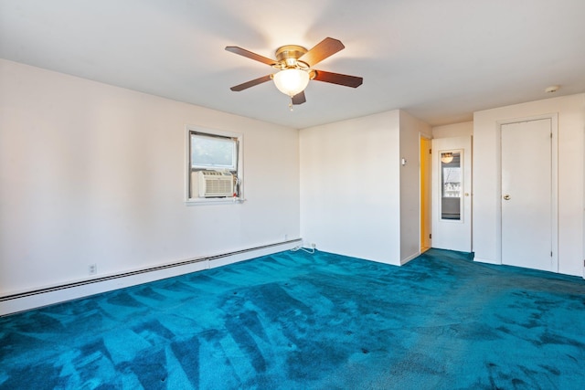 carpeted empty room featuring ceiling fan and a baseboard heating unit