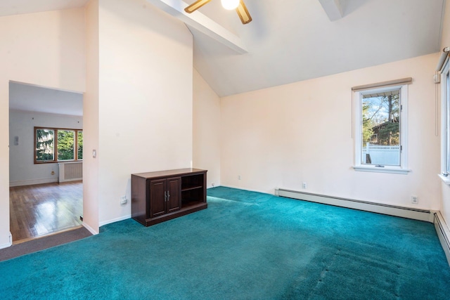 unfurnished room featuring a wealth of natural light, high vaulted ceiling, and dark carpet