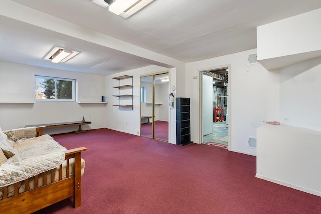 living area featuring carpet