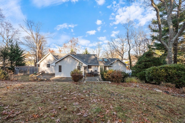 back of property featuring a patio