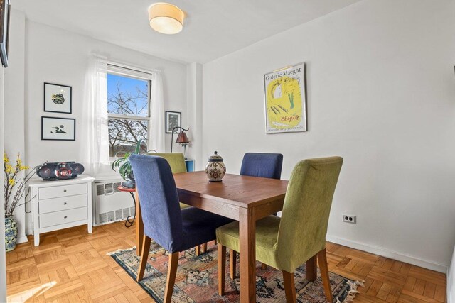 5500 Fieldston Rd Unit 5Cc, Bronx, NY 10471 - dining room with radiator heating unit and baseboards