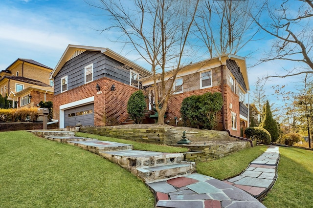 view of front of property with a front lawn and a garage