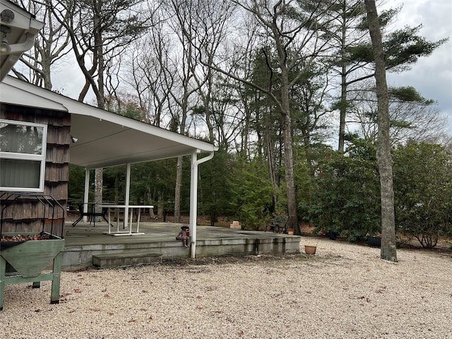 view of property's community featuring a wooden deck