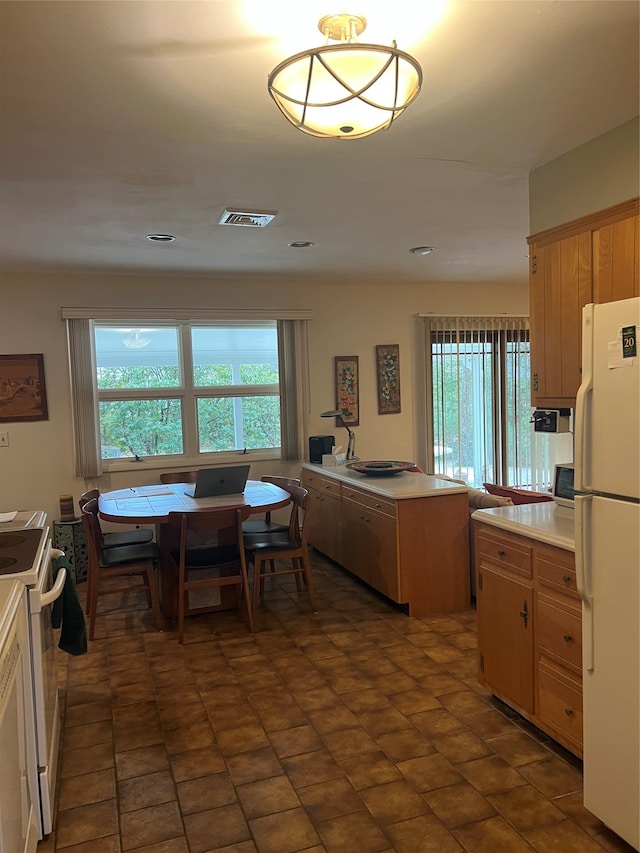 kitchen featuring white appliances