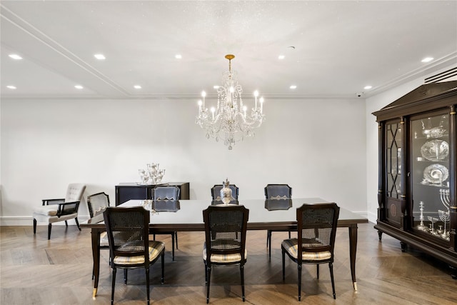 dining area featuring a notable chandelier, parquet flooring, and ornamental molding