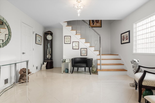 foyer entrance featuring light tile patterned flooring