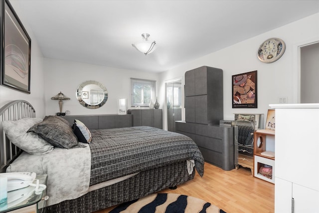 bedroom with wood-type flooring