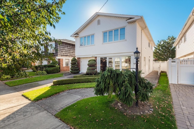 view of front of house with a front lawn